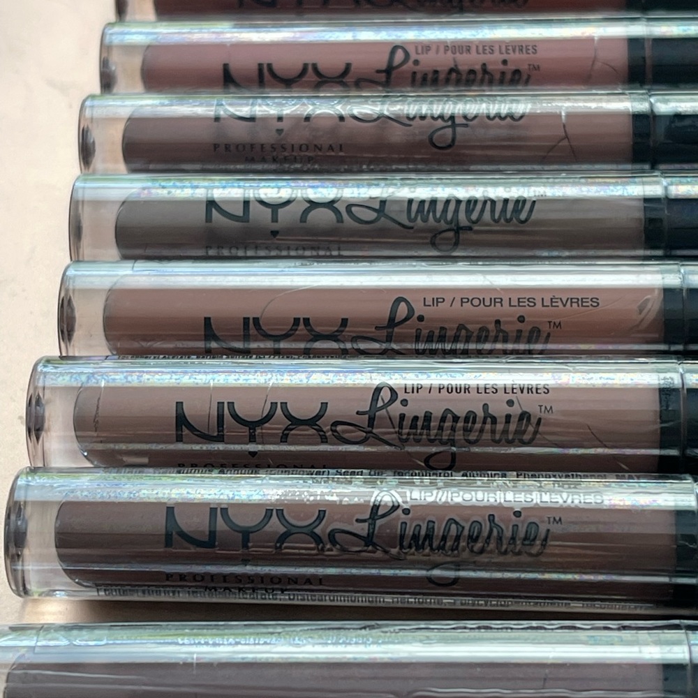 9 New and Unused Full Size Lip Glosses by NYK